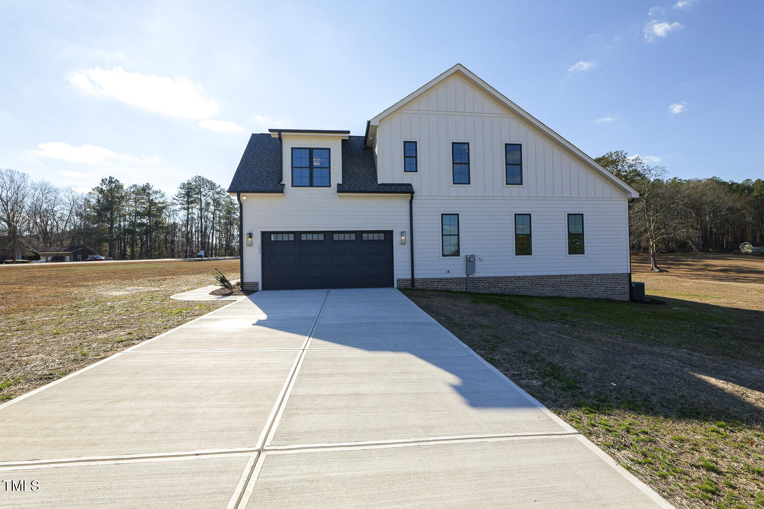 593 Pope Lake Road Angier, NC 27501 - Photo 6 of 48 a front view of a house with a yard