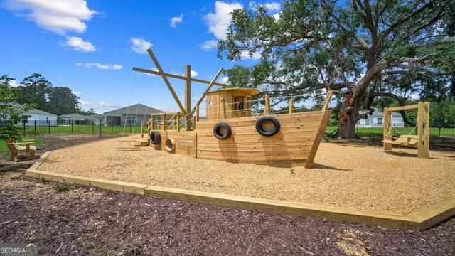 a view of a golf course with a lake