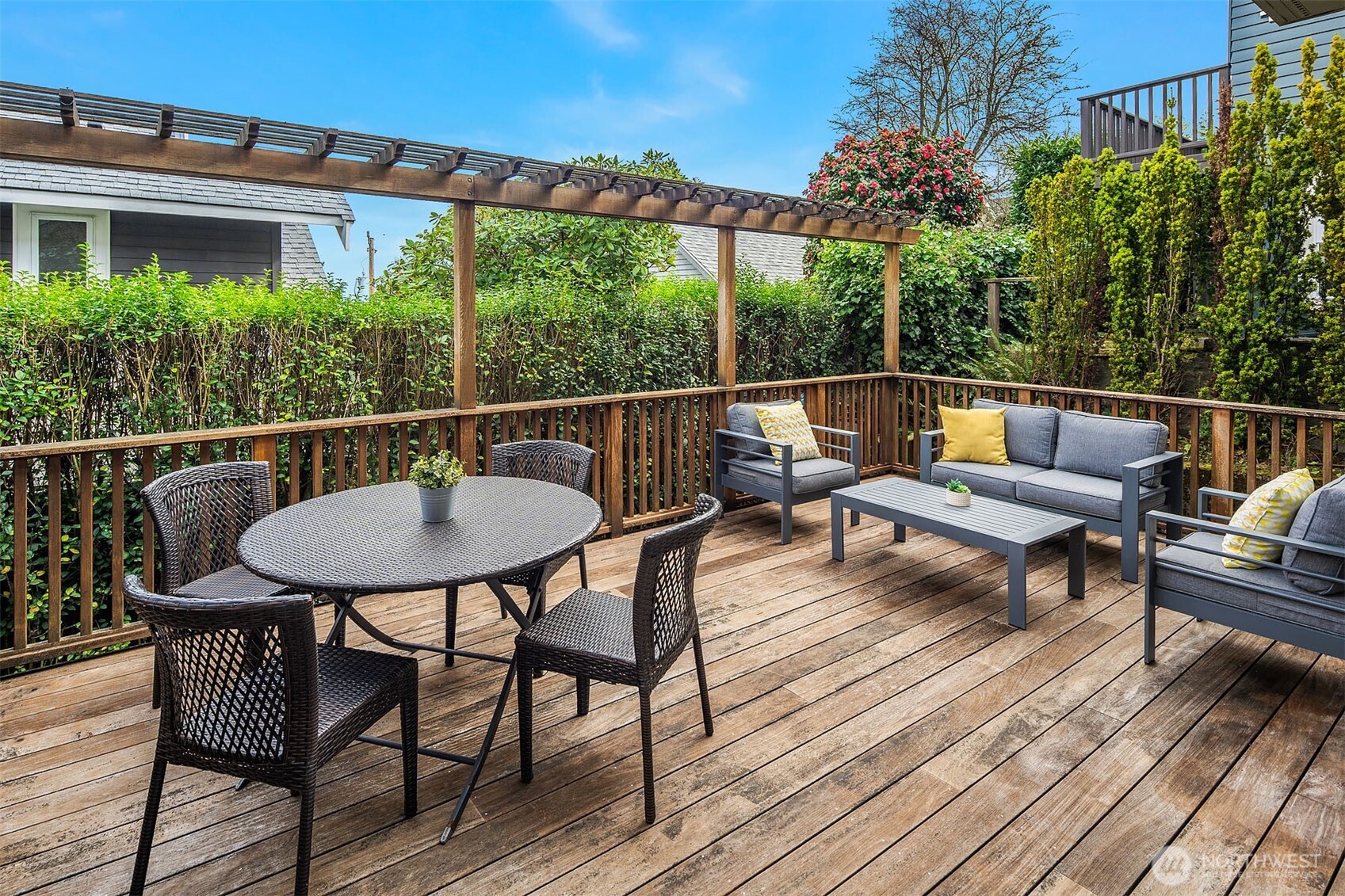 1520 37th Avenue Seattle, WA 98122 - Photo 14 of 35 a balcony with wooden floor and outdoor seating
