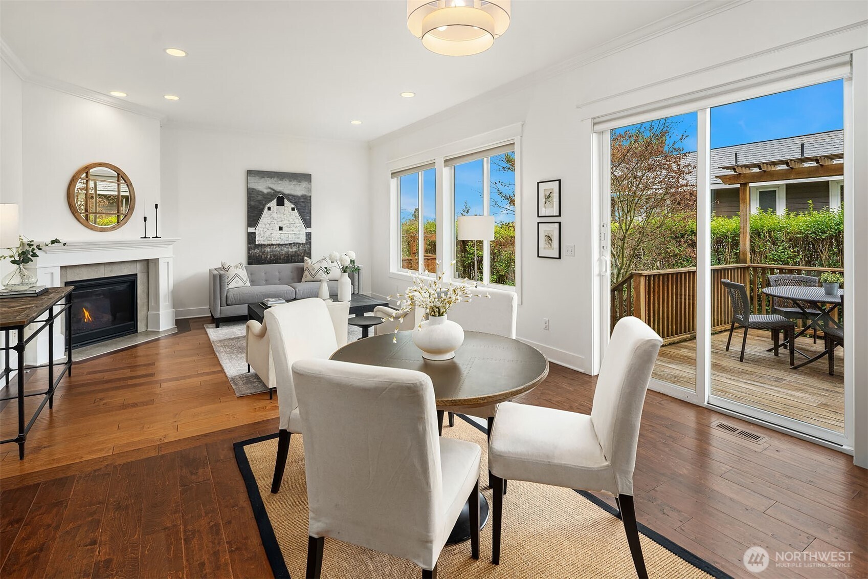 1520 37th Avenue Seattle, WA 98122 - Photo 6 of 35 a dining room with furniture a fireplace and wooden floor