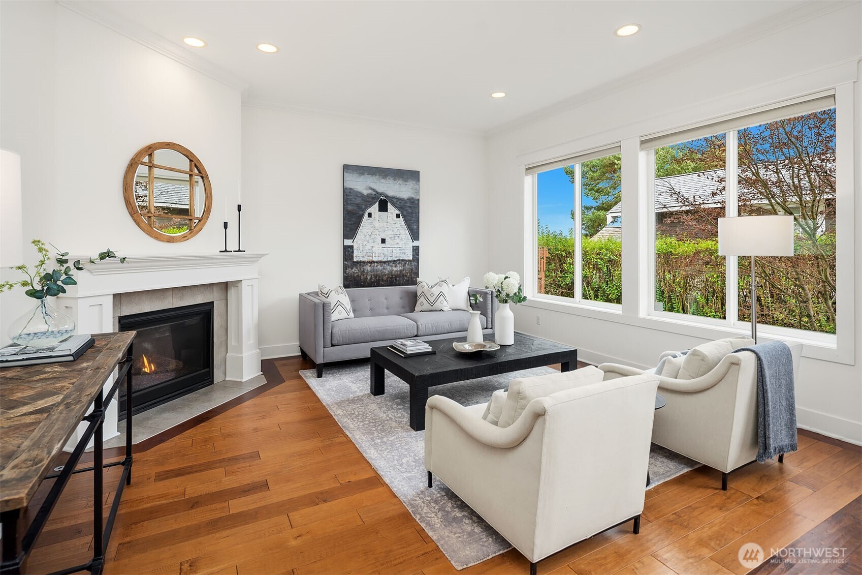 1520 37th Avenue Seattle, WA 98122 - Photo 8 of 35 a living room with furniture a large window and a fireplace