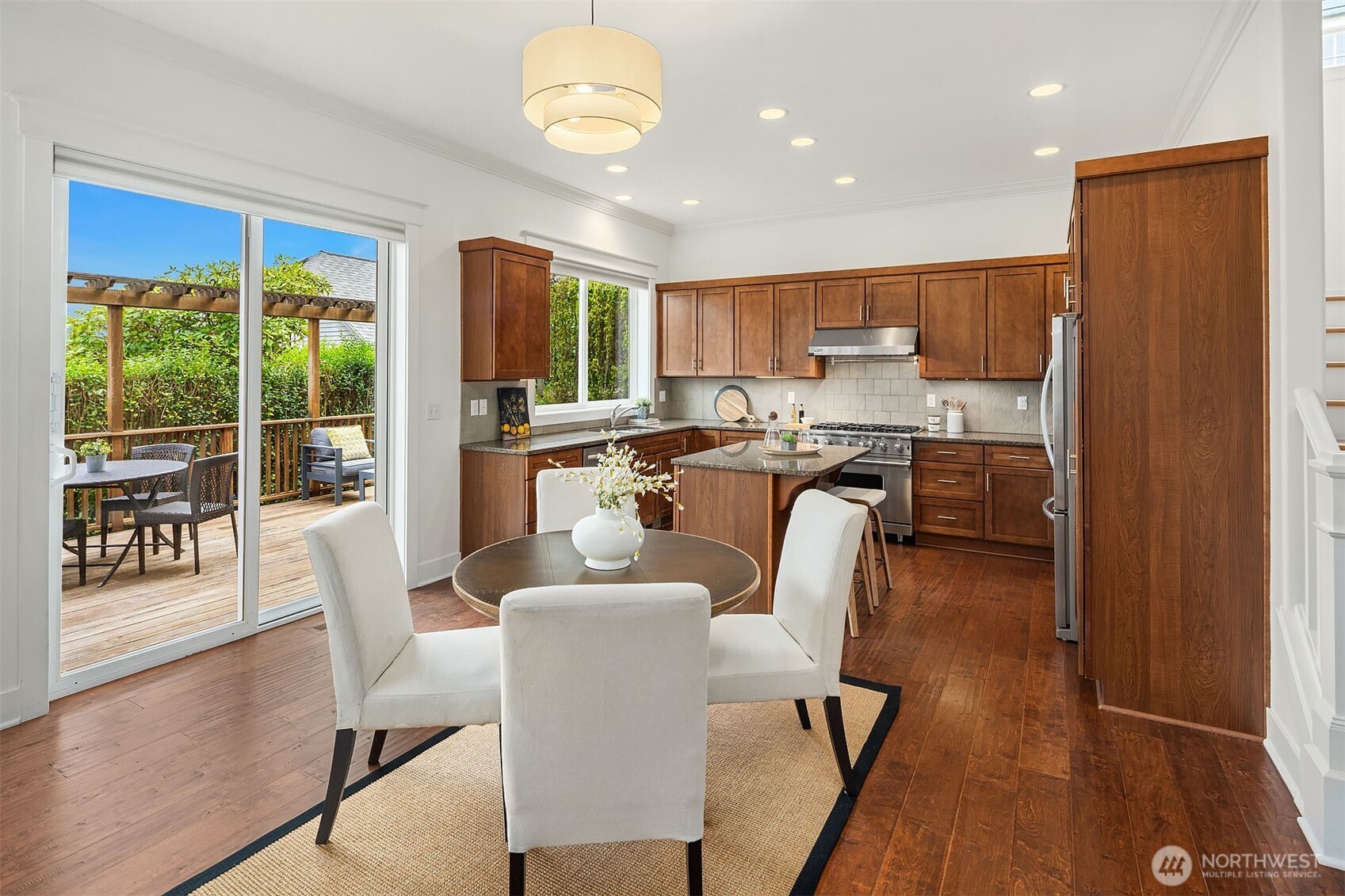 1520 37th Avenue Seattle, WA 98122 - Photo 10 of 35 a dining room with furniture a window and kitchen view
