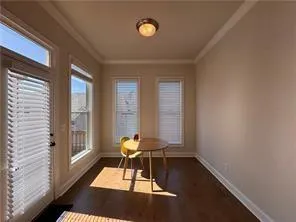 a view of a living room with furniture