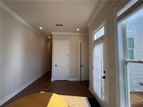 a bathroom with a sink mirror vanity and toilet