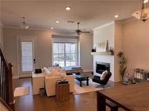 a kitchen with sink stove top oven and refrigerator