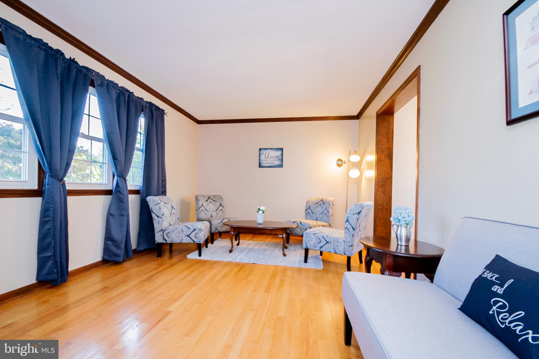 218 Sugar Pine Drive Middletown, DE 19709 - Photo 13 of 48 Sunny living rooms with beautiful hardwood floors