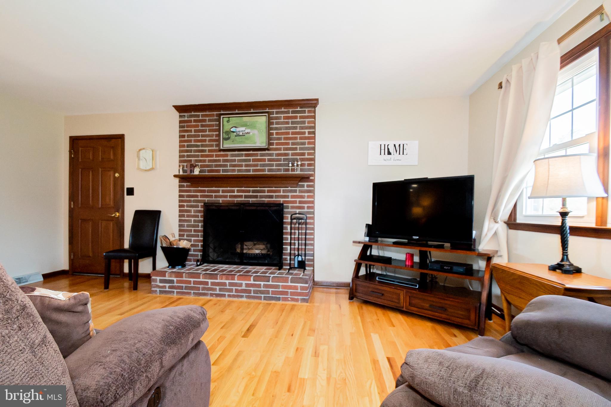 218 Sugar Pine Drive Middletown, DE 19709 - Photo 17 of 48 Wood burning fireplace in family room