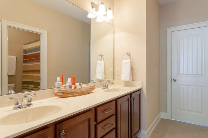 12825 Edsel Drive Raleigh, NC 27613 - Photo 20 of 25 Shared bath for two bedrooms on second floor. Bathroom