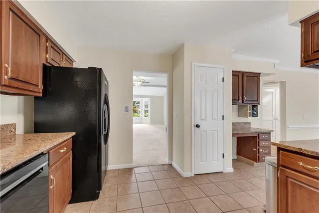 a kitchen with a sink counter top space and appliances