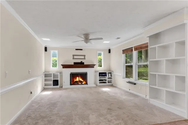 a backyard of a house with plants and trees