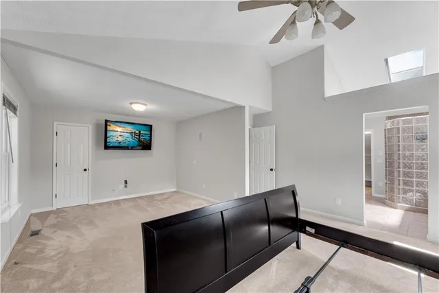 a bathroom with a bathtub and shower