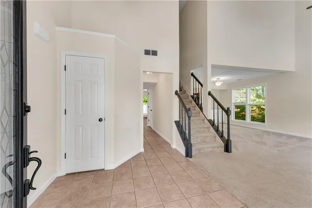 a view of an entryway with stairs