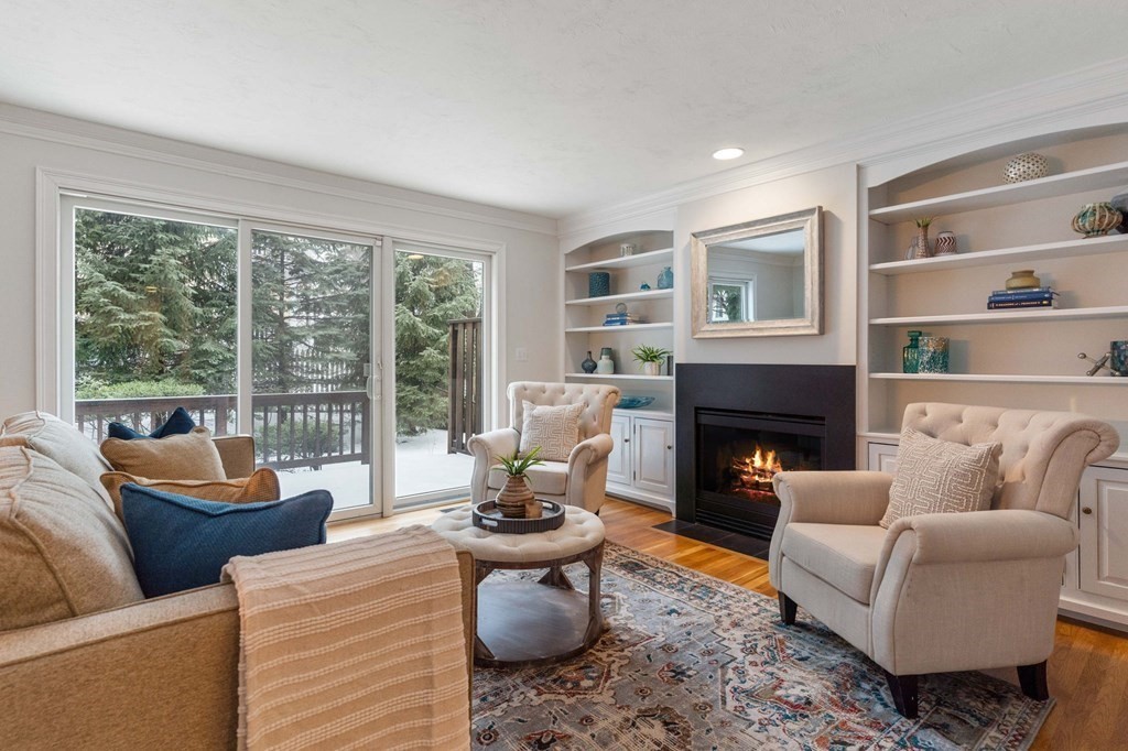 11 Meadowbrook Road, Unit 11 Brookline, MA 02467 - Photo 12 of 42 a living room with furniture and a fireplace