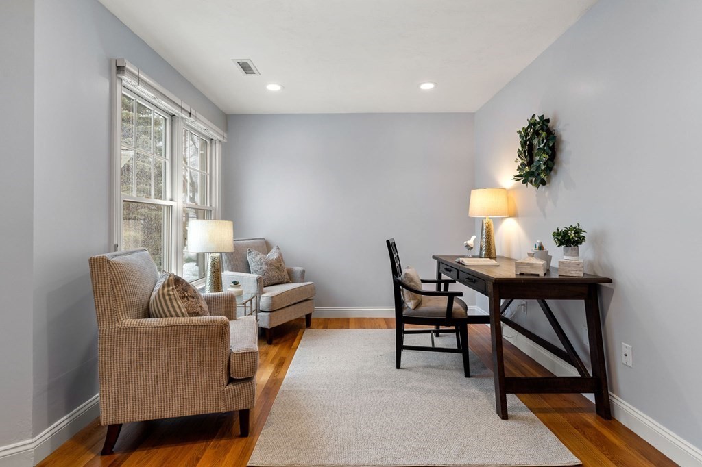11 Meadowbrook Road, Unit 11 Brookline, MA 02467 - Photo 24 of 42 a living room with furniture and a window