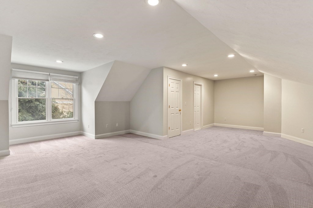 11 Meadowbrook Road, Unit 11 Brookline, MA 02467 - Photo 29 of 42 a view of an empty room with a window