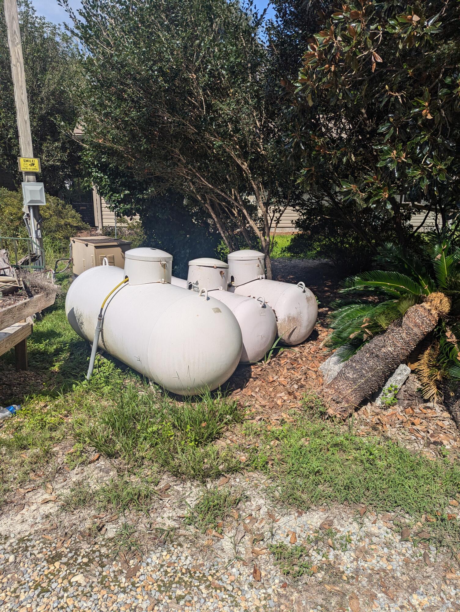 4964 Retreat Inlet Baker, FL 32531 - Photo 11 of 28 a view of a backyard with large trees and plants