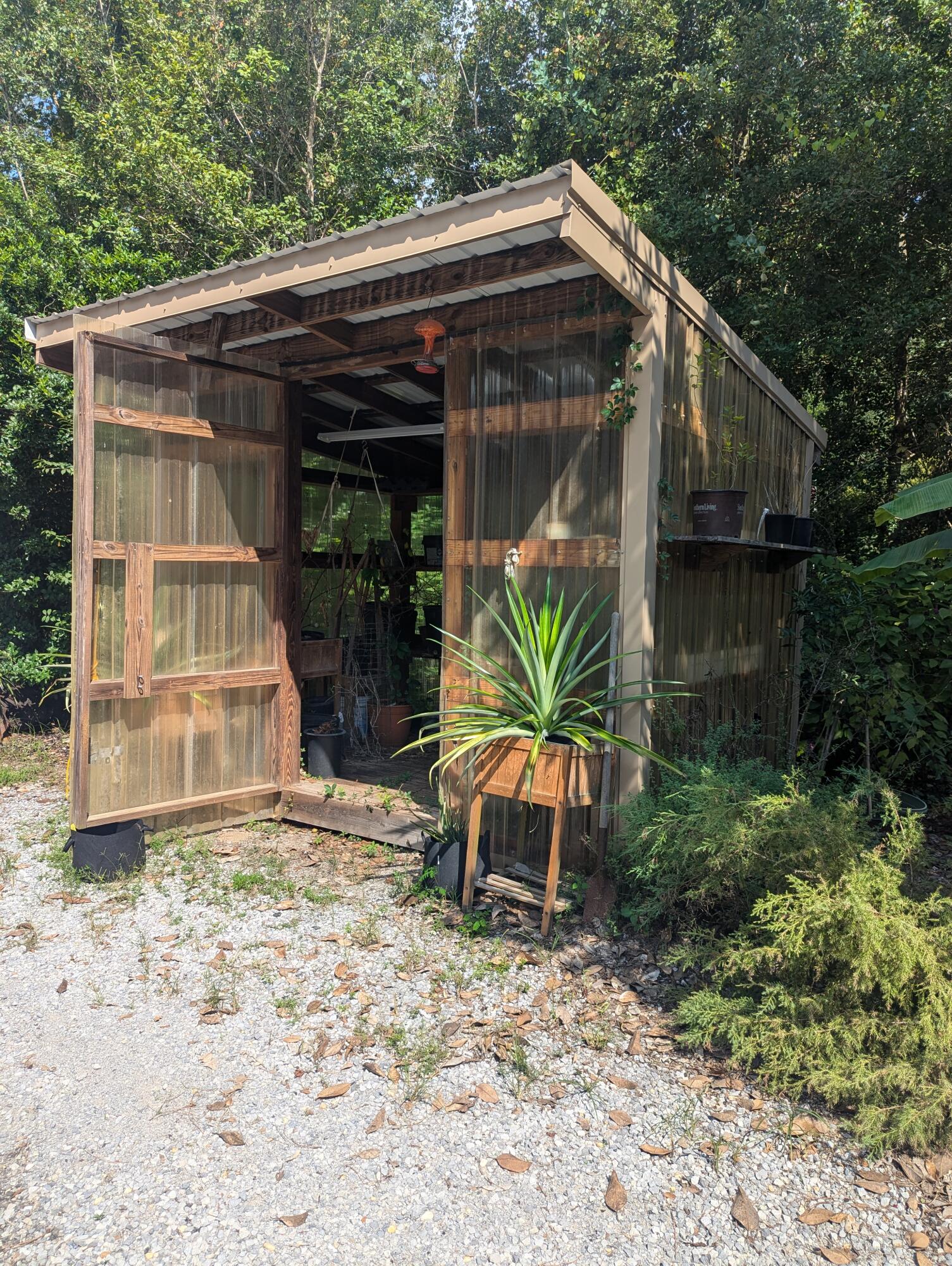 4964 Retreat Inlet Baker, FL 32531 - Photo 13 of 28 a backyard of a house with yard and outdoor seating