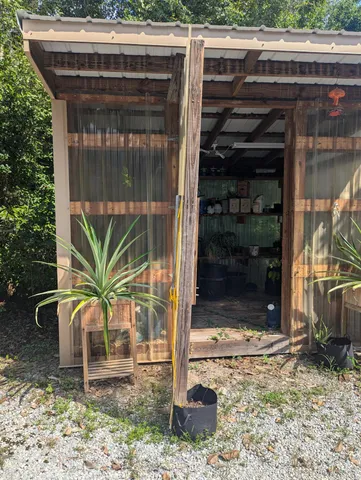 a glass door with a yard