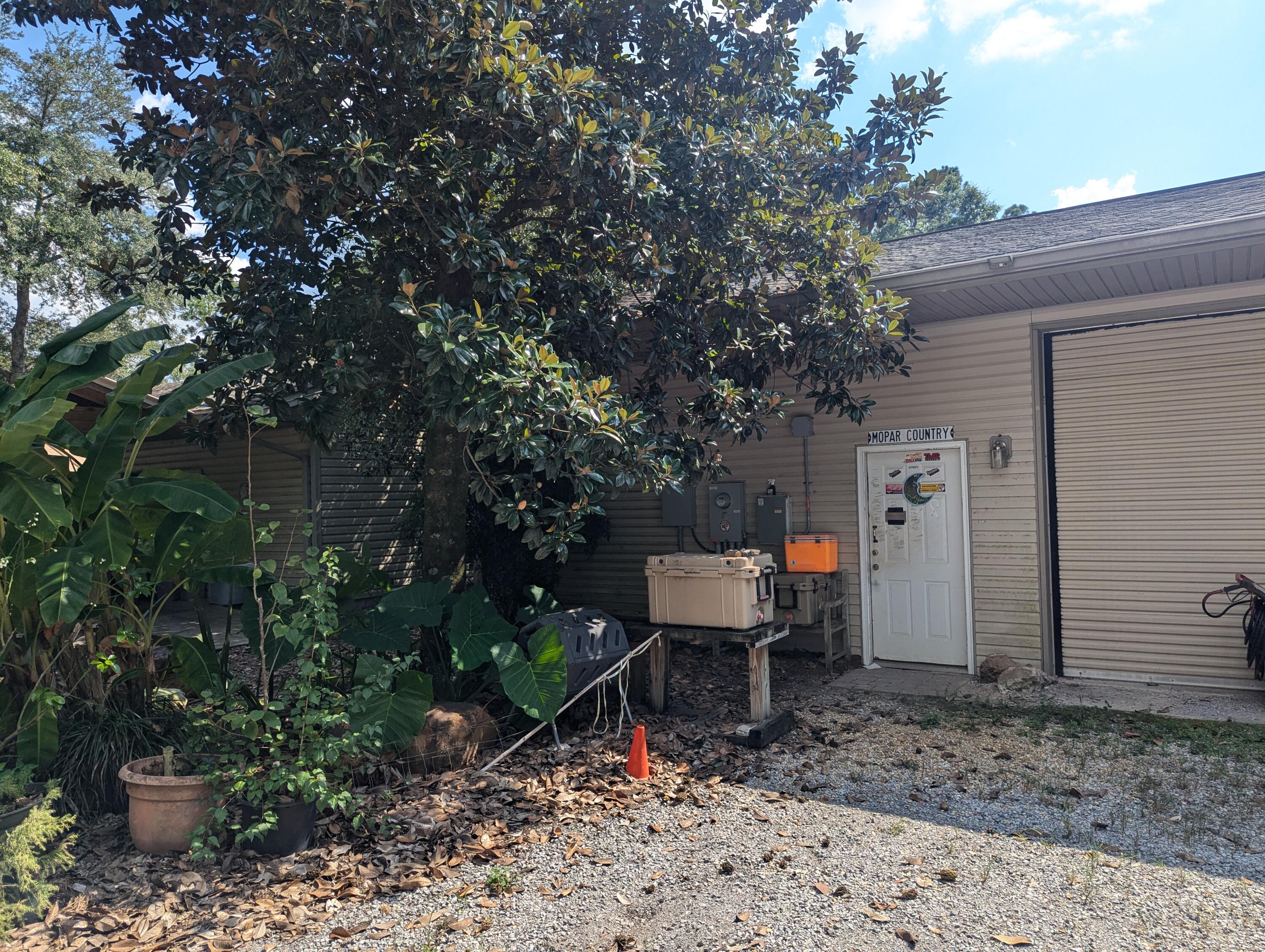 4964 Retreat Inlet Baker, FL 32531 - Photo 15 of 28 a view of a backyard with sitting area