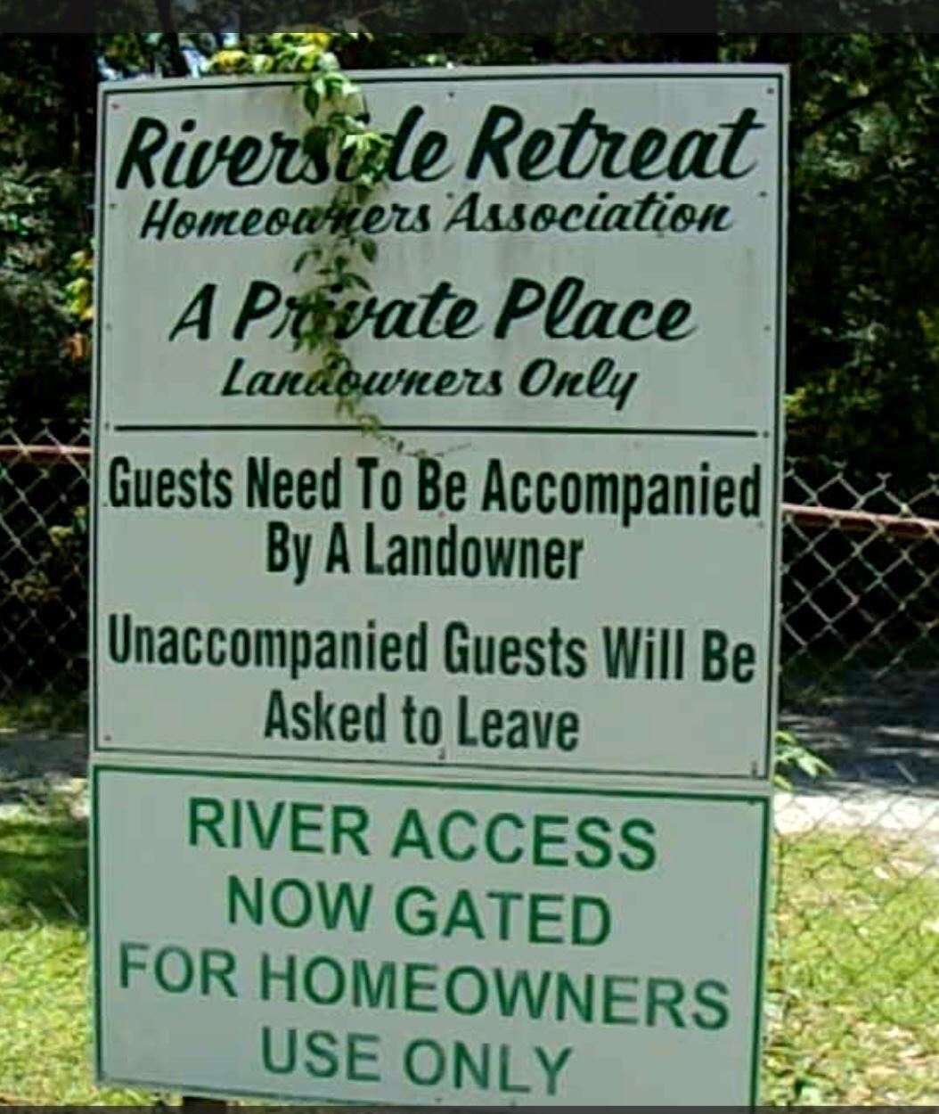 4964 Retreat Inlet Baker, FL 32531 - Photo 28 of 28 a sign on the side of a building