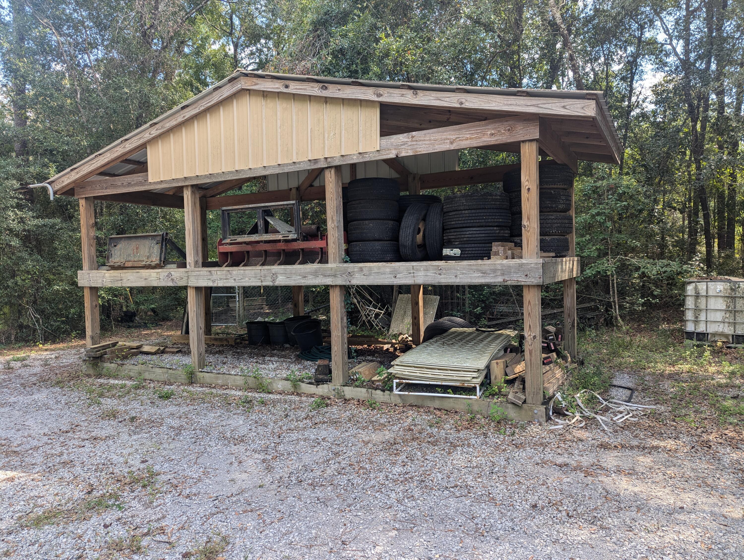 4964 Retreat Inlet Baker, FL 32531 - Photo 4 of 28 a view of a house with backyard