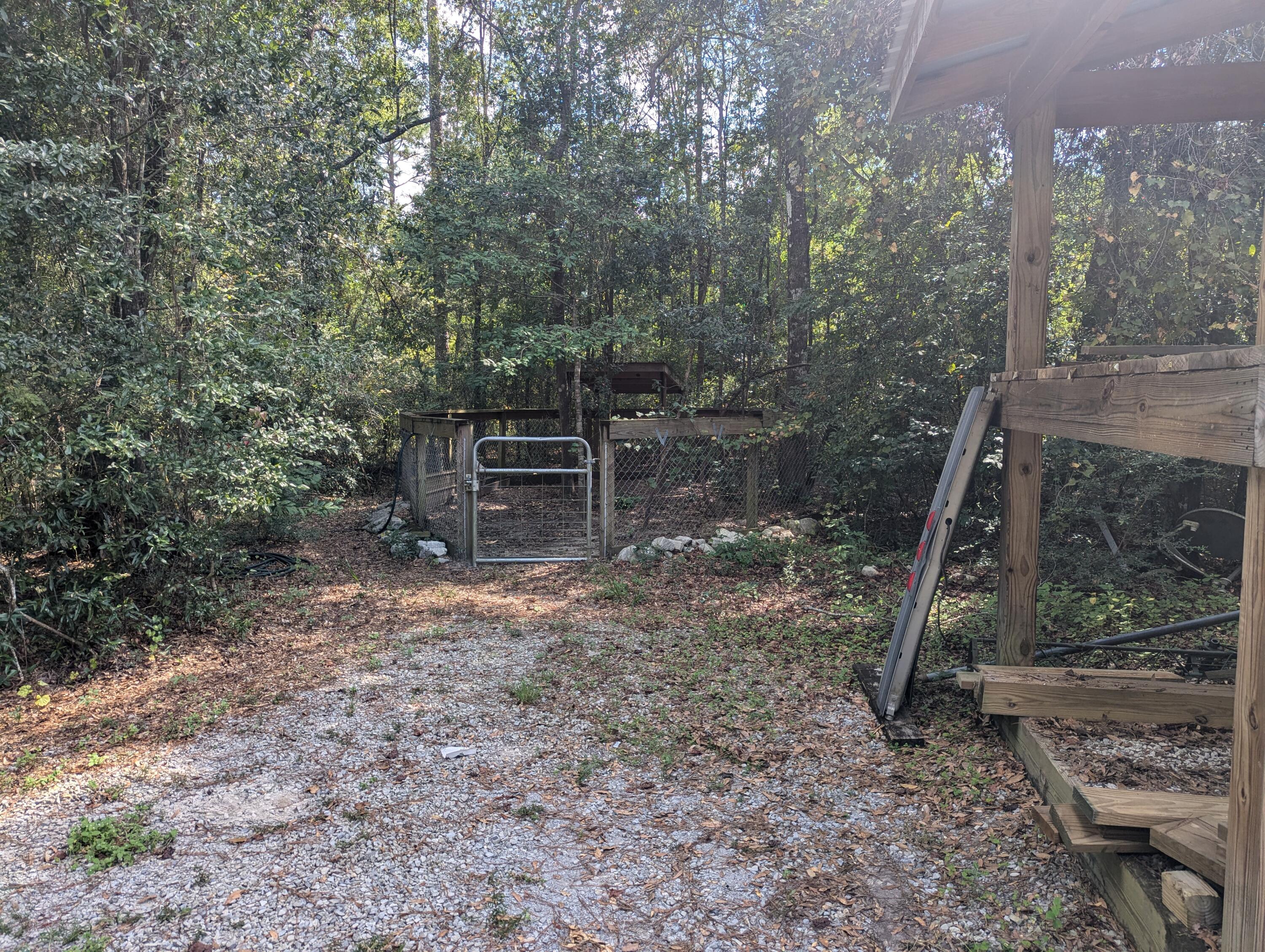4964 Retreat Inlet Baker, FL 32531 - Photo 5 of 28 a backyard of a house with lots of green space