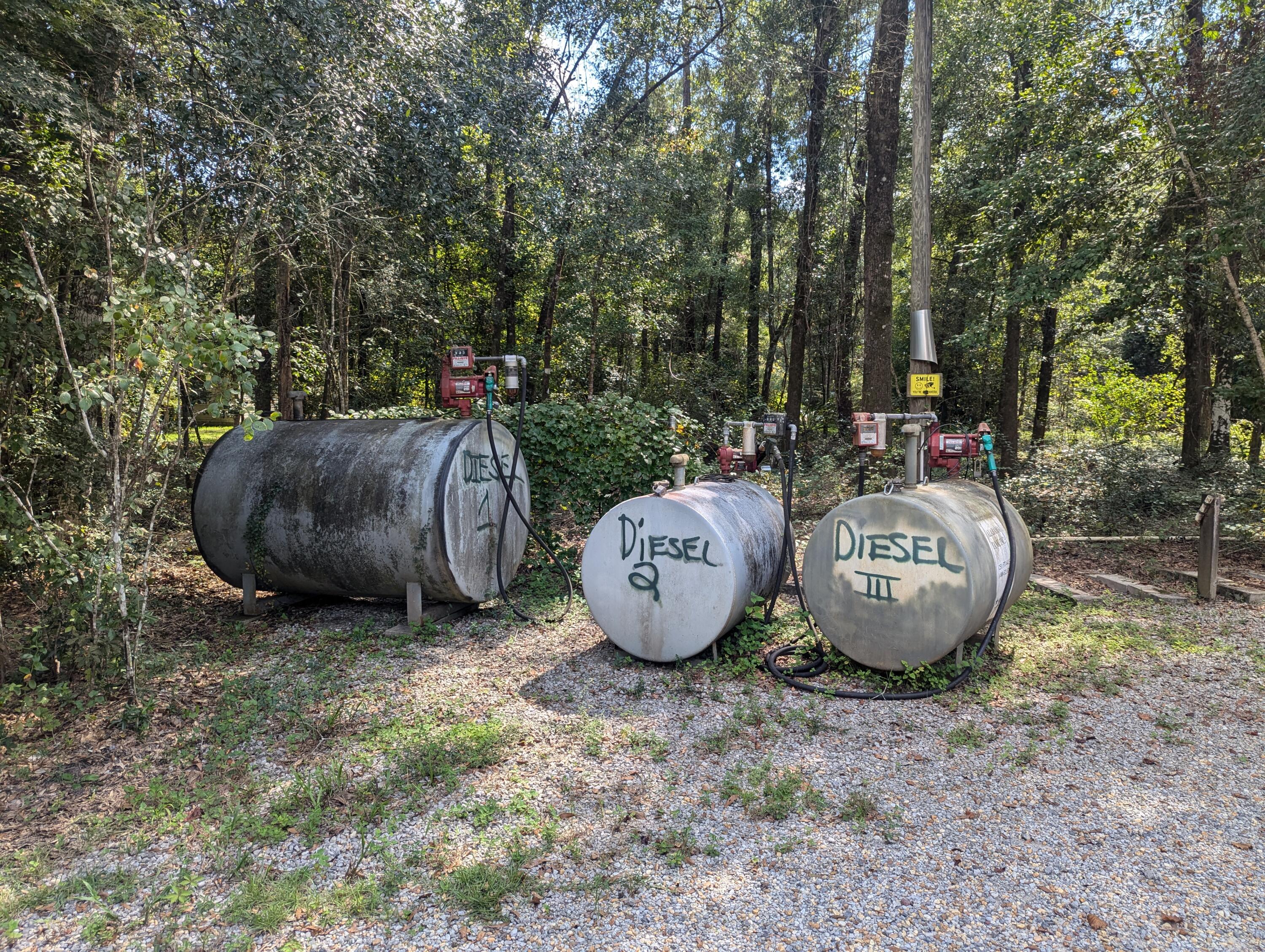 4964 Retreat Inlet Baker, FL 32531 - Photo 6 of 28 a view of a backyard with table and chairs