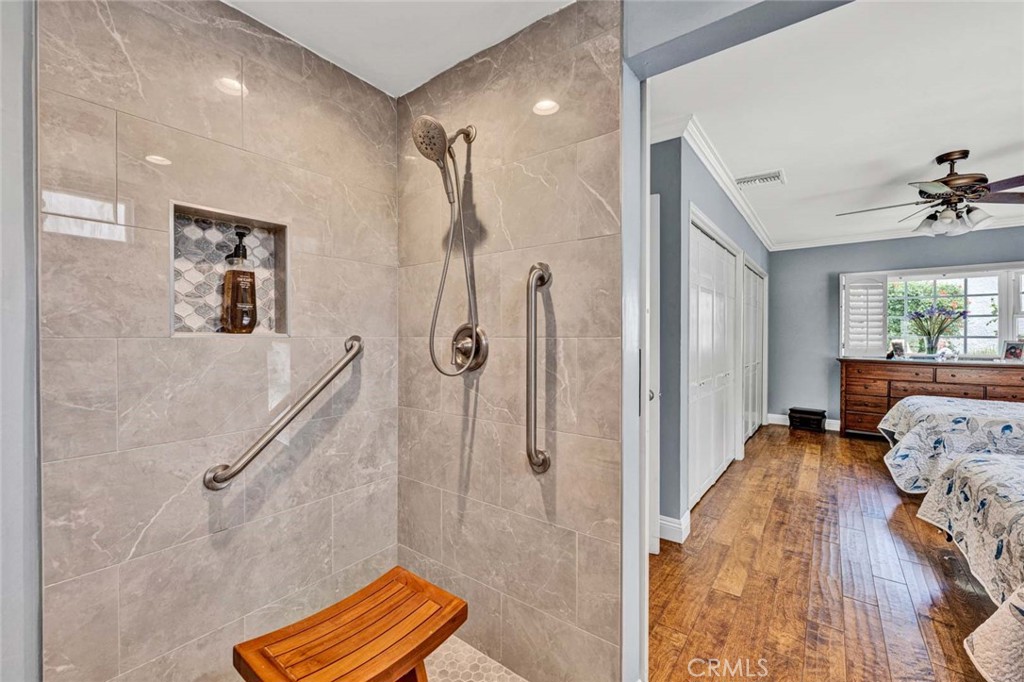 5456 Cadbury Road Whittier, CA 90601 - Photo 24 of 67 a bathroom with a tub and shower