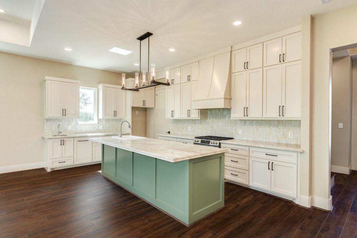 1737 Flintlock Court Angleton, TX 77515 - Photo 21 of 47 Tall ceilings and tons of natural light really make this space. With large sliding glass doors over looking the back yard area this entire downstairs main living is ideal for relaxing evenings or gatherings.