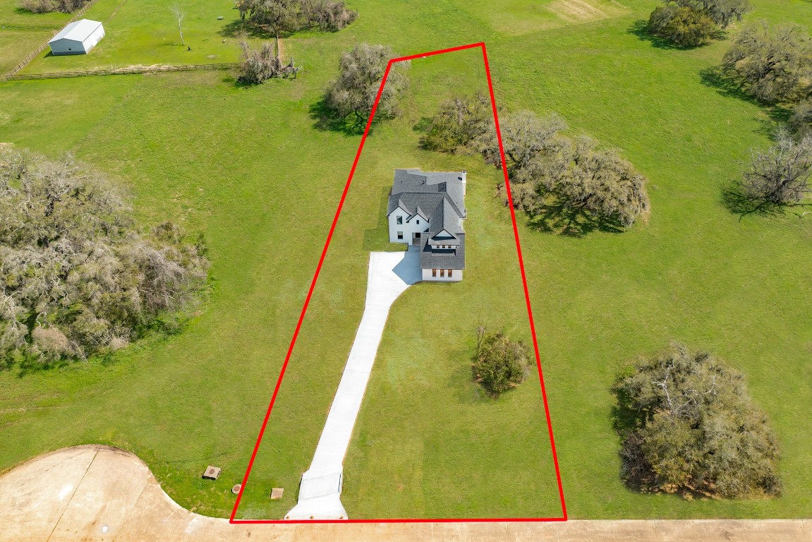 1737 Flintlock Court Angleton, TX 77515 - Photo 3 of 47 This property is surround by some beautiful oak trees and with no neighbors around you get the private escape youve been looking for.