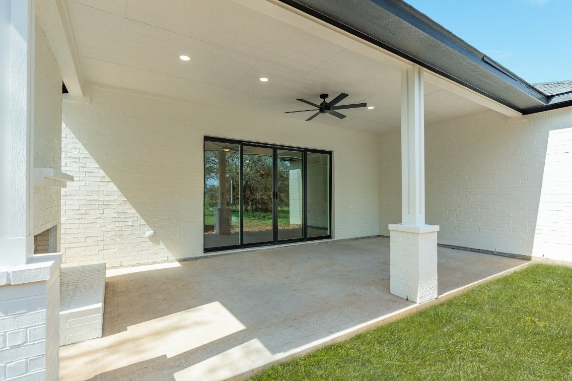 1737 Flintlock Court Angleton, TX 77515 - Photo 6 of 47 Sliding doors leading to the outdoor patio creats and ideal indoor-outdoor space perfect for those who enjoy spending time outside.
