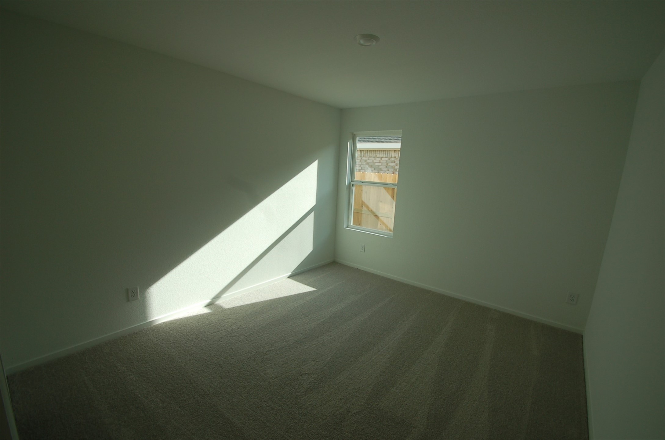 16130 Rustic Prairie Hockley, TX 77447 - Photo 11 of 21 a view of an empty room and window