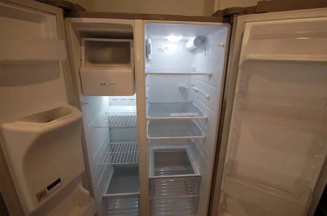 a bathroom with a shower and toilet