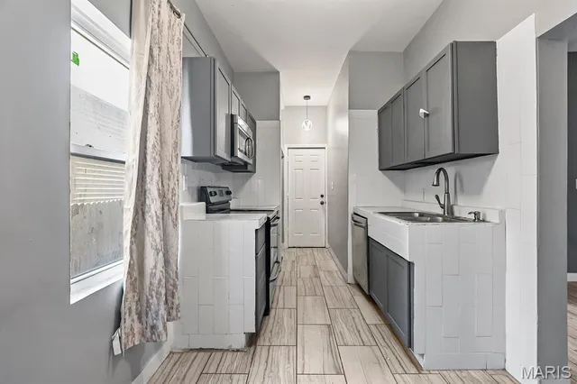 $99,000 | 6745 Vernon Avenue, University City, MO 63130