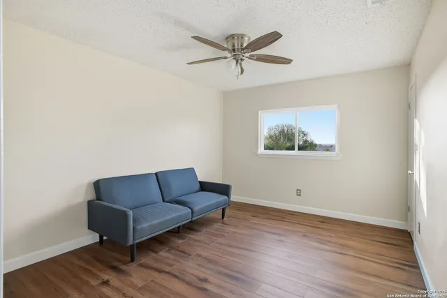a view of a glass door and a window
