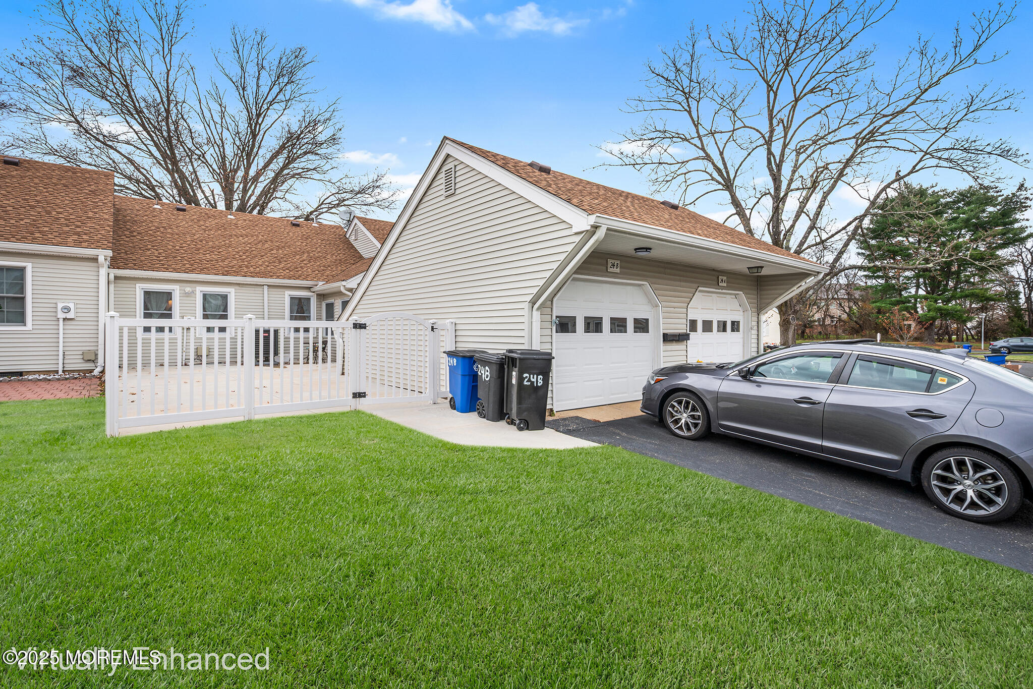 24 Calle De Elvira, Unit B Freehold, NJ 07728 - Photo 24 of 25 a view of a white house in a back yard