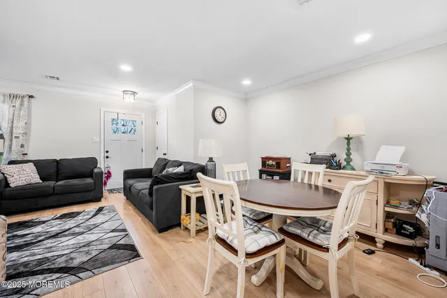 a living room with furniture and a table
