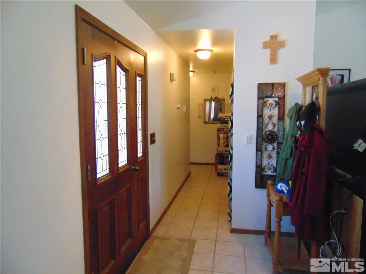 3255 Alcorn Road Fallon, NV 89406 - Photo 8 of 25 a view of a hallway with closet