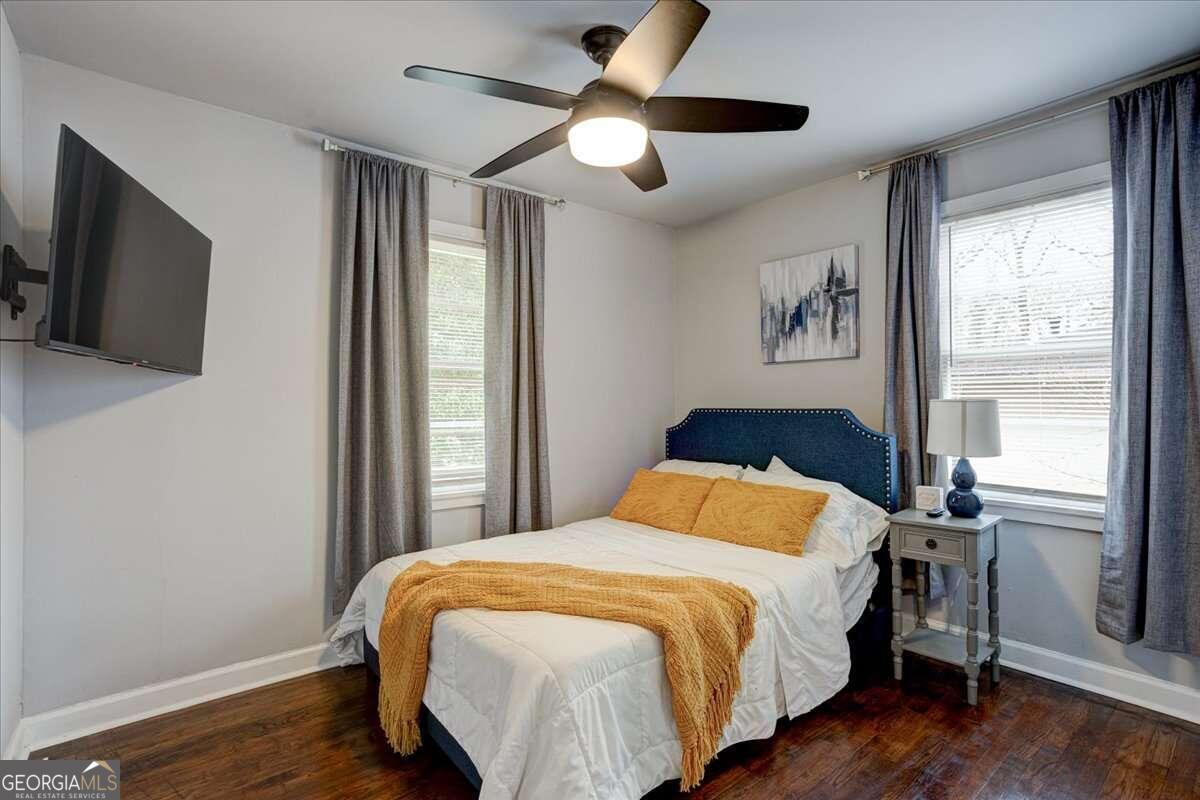 130 Mount Zion Road Southwest Atlanta, GA 30354 - Photo 12 of 22 a bedroom with a large bed and a tv