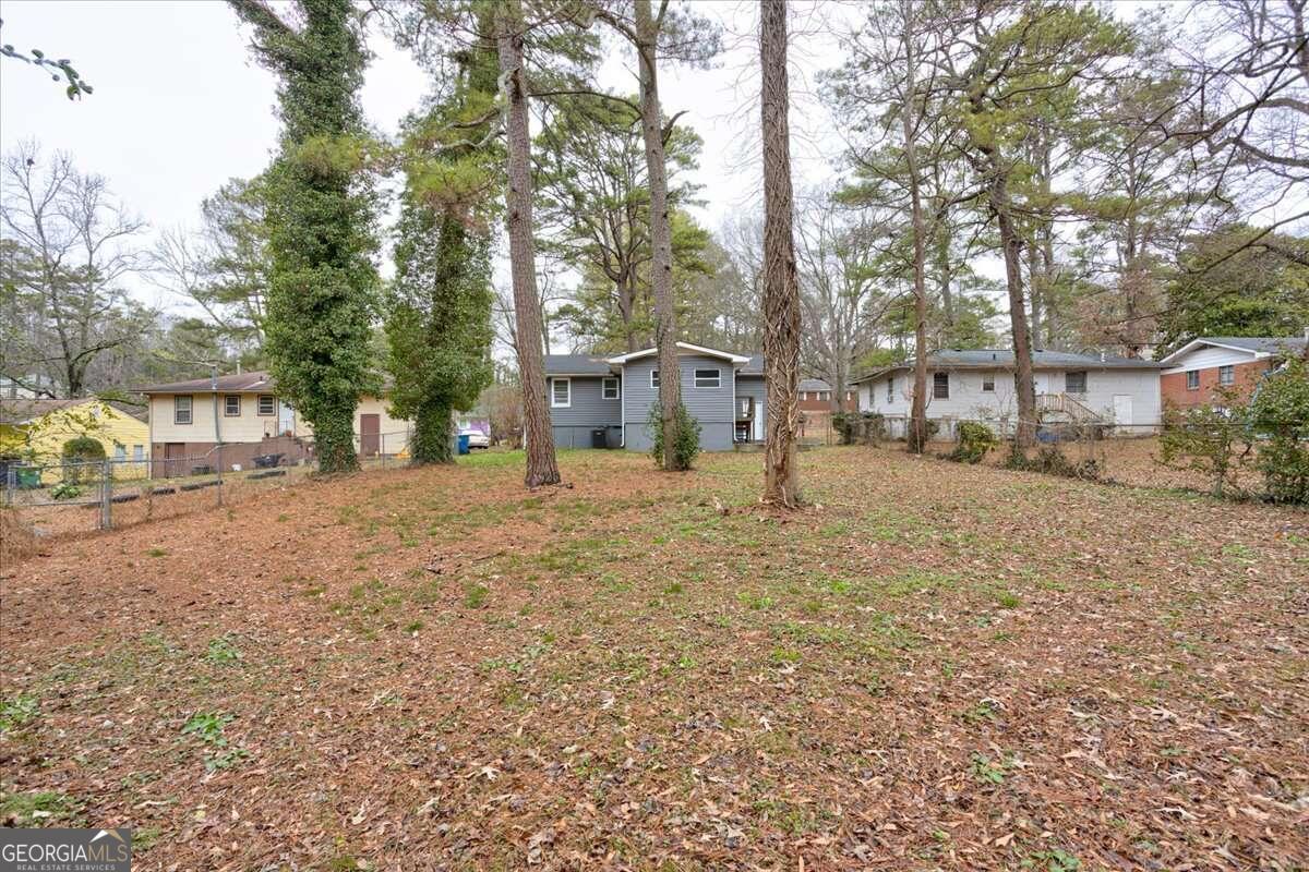 130 Mount Zion Road Southwest Atlanta, GA 30354 - Photo 19 of 22 a view of a yard with a large tree