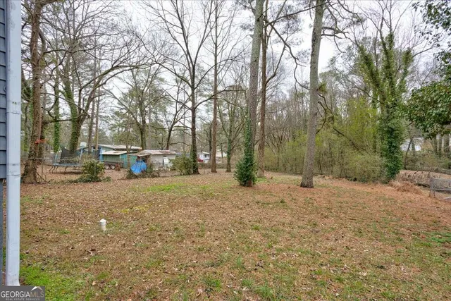 a house with trees in front of it