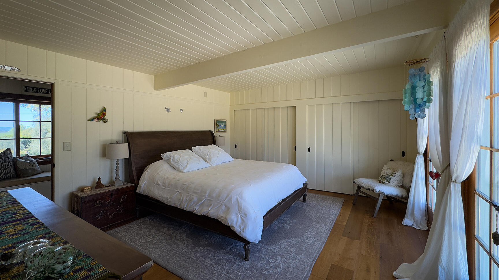 2852 Tapadero Road Solvang, CA 93463 - Photo 14 of 52 a bedroom with a bed and a couch