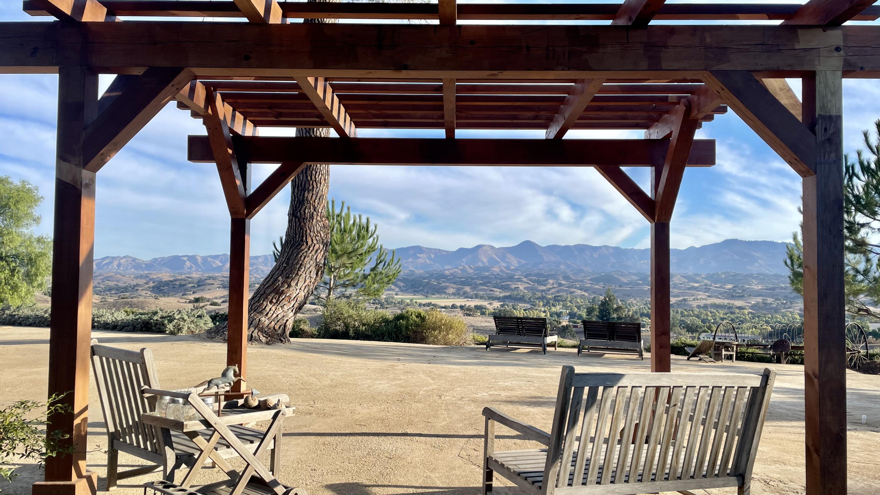 2852 Tapadero Road Solvang, CA 93463 - Photo 28 of 52 a view of porch with a table chairs and a table