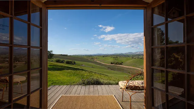 a view of a swimming pool with an ocean view