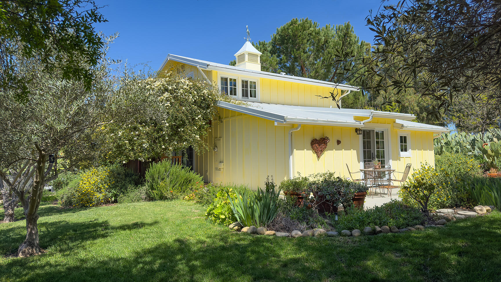 2852 Tapadero Road Solvang, CA 93463 - Photo 40 of 52 a front view of a house with a yard