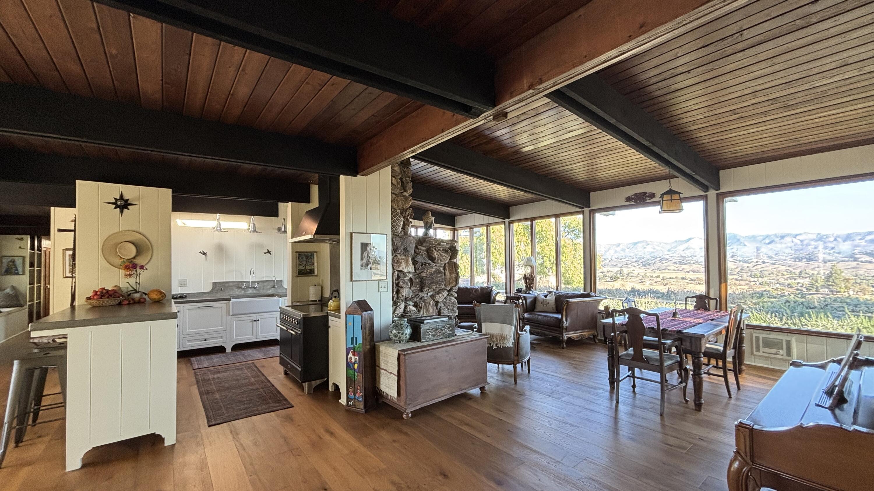 2852 Tapadero Road Solvang, CA 93463 - Photo 8 of 52 a view of a kitchen with furniture and wooden floor