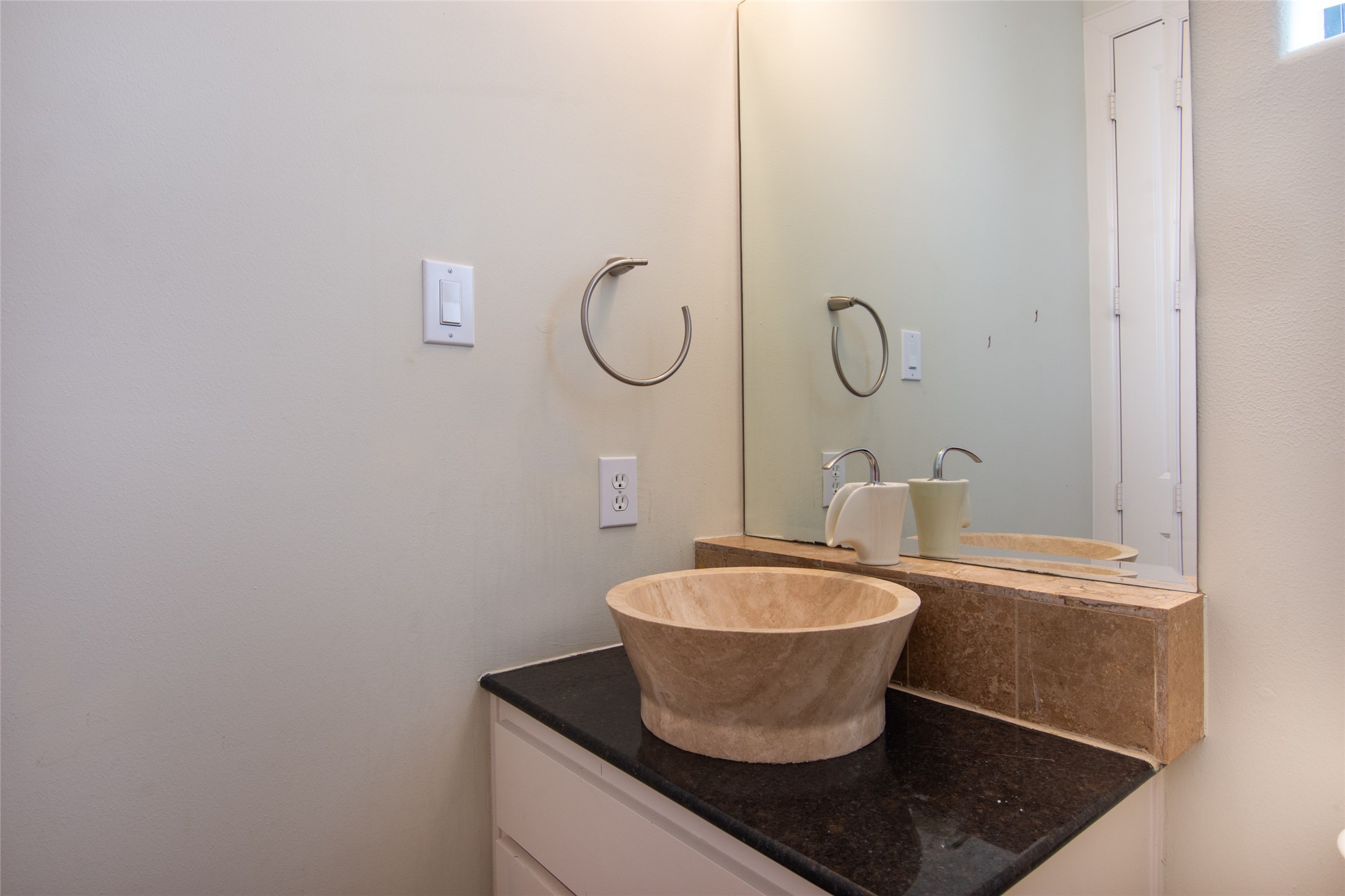 5505 Rose Street Houston, TX 77007 - Photo 15 of 35 a bathroom with a granite countertop sink and a mirror
