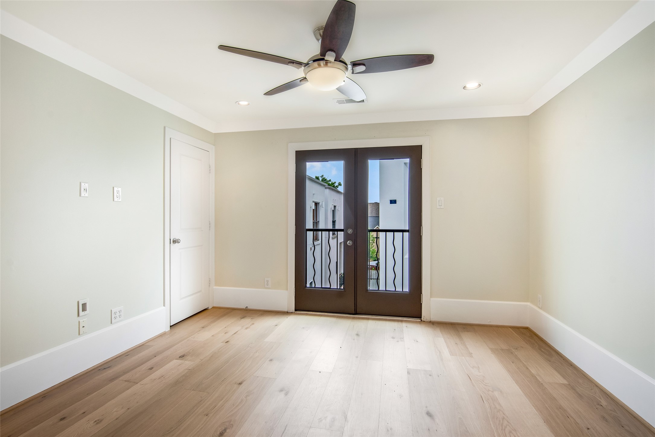 5505 Rose Street Houston, TX 77007 - Photo 24 of 35 a view of an empty room with a window and wooden floor
