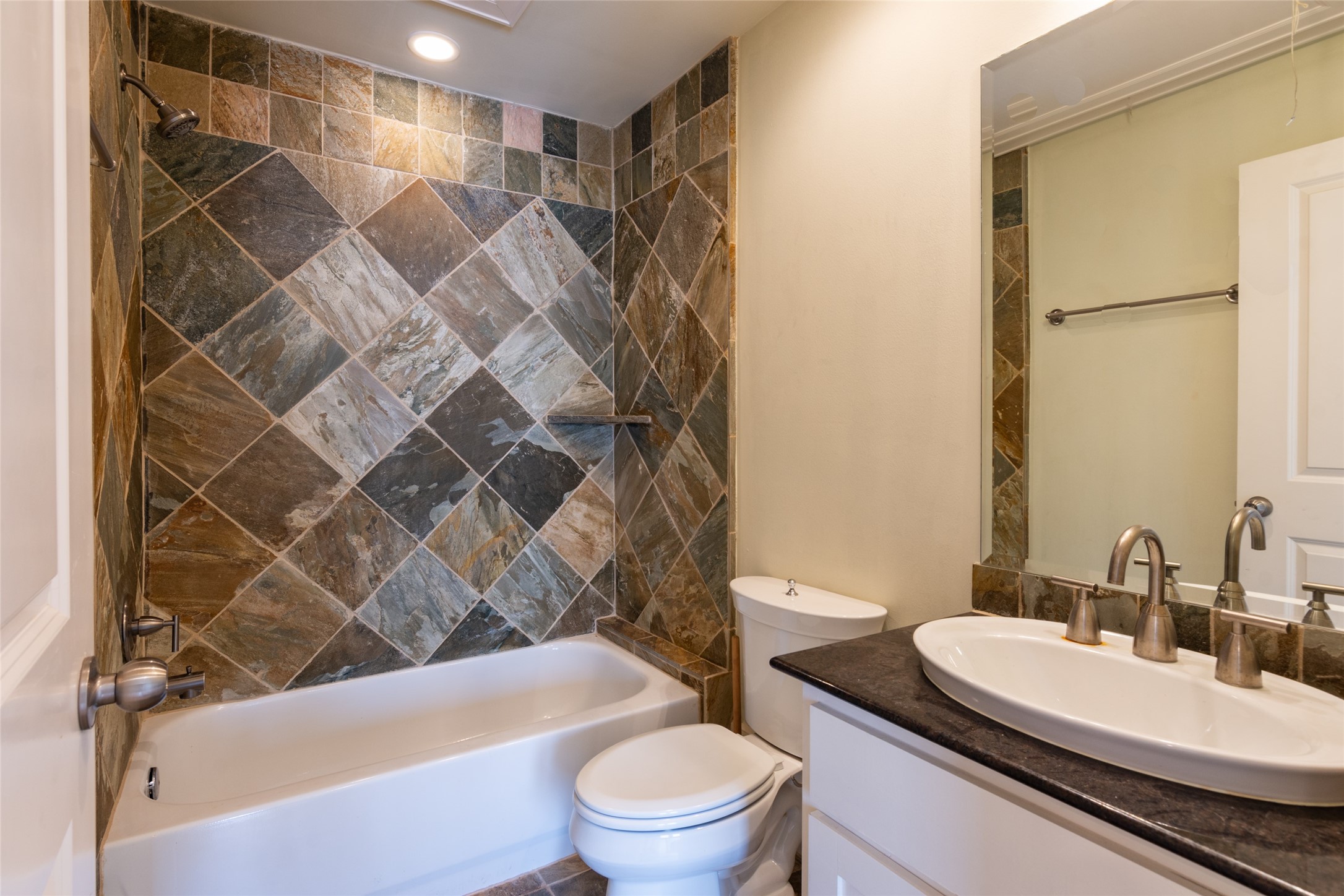 5505 Rose Street Houston, TX 77007 - Photo 26 of 35 a bathroom with a sink toilet and shower