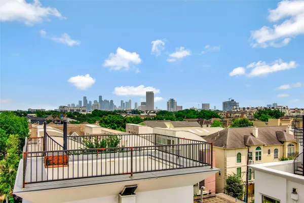 a view of a city from a balcony